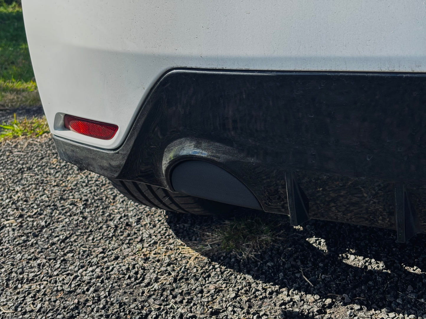 Exhaust cutout cover suitable for GR Yaris by QSN Engineering